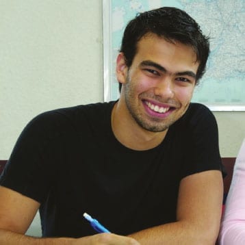 Tanned skin male student.