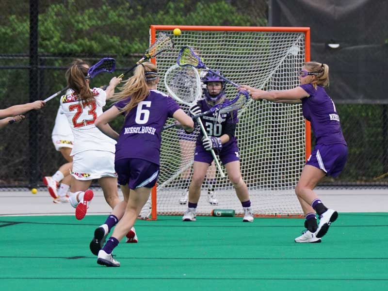 students playing lacrosse