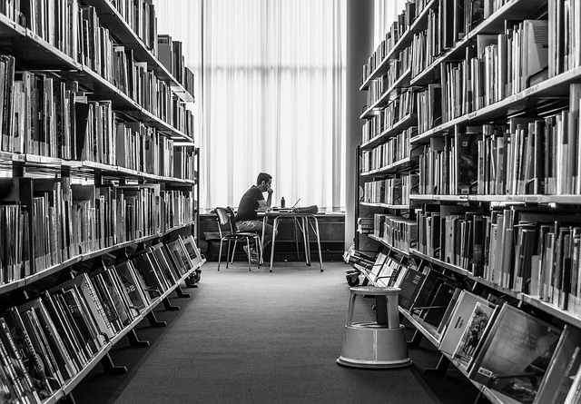 student in library